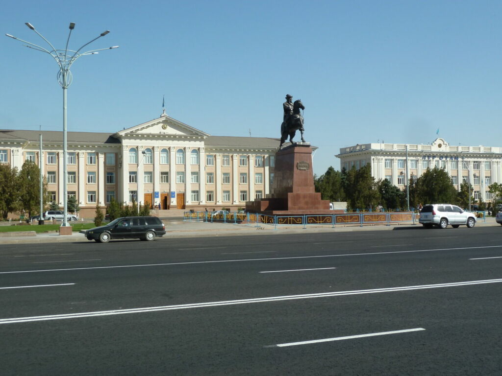 Statue in front of grand building