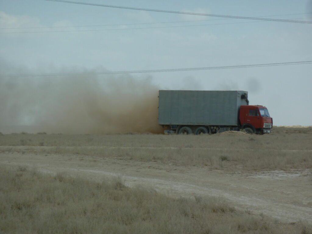 Truck with dust at the back