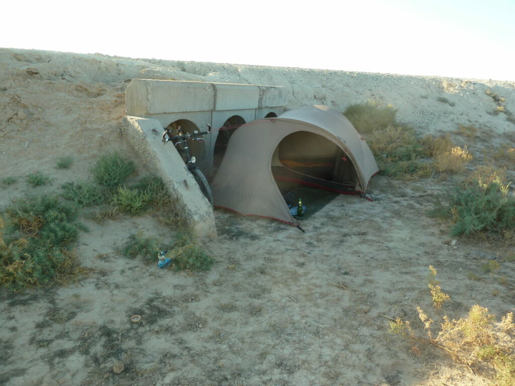 Tent by pipes