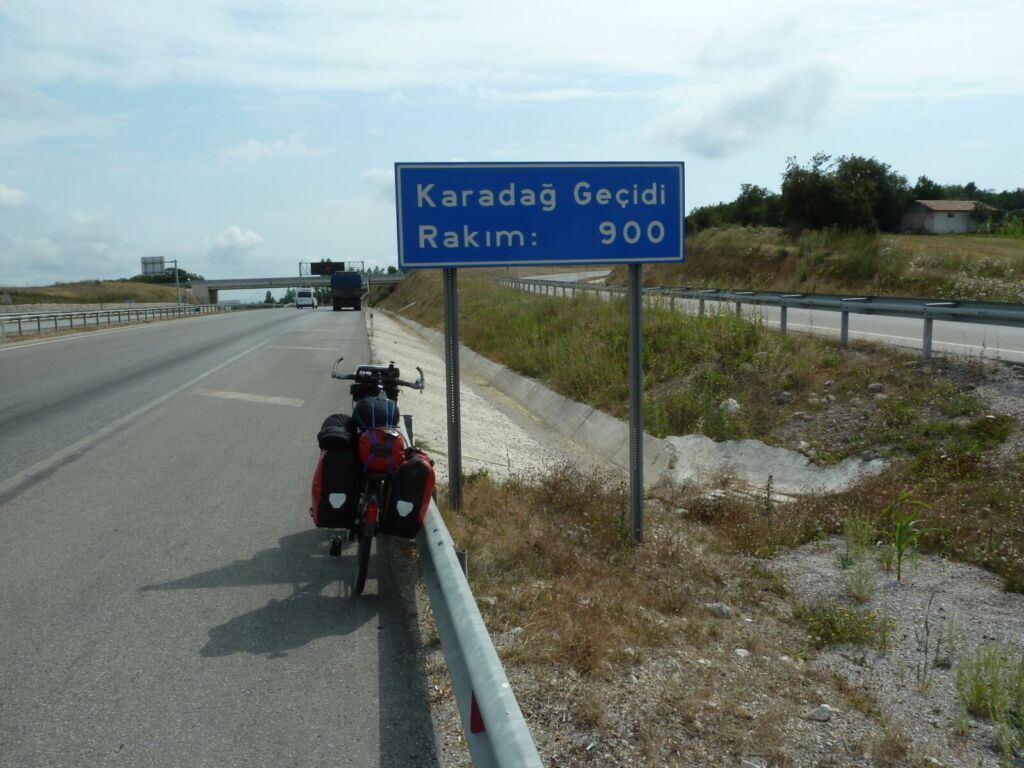 Bike by road sign