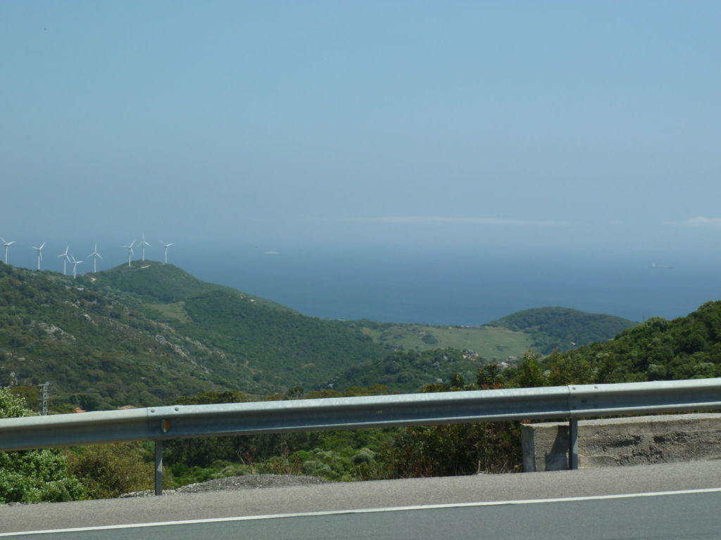 Hills wind turbines sea