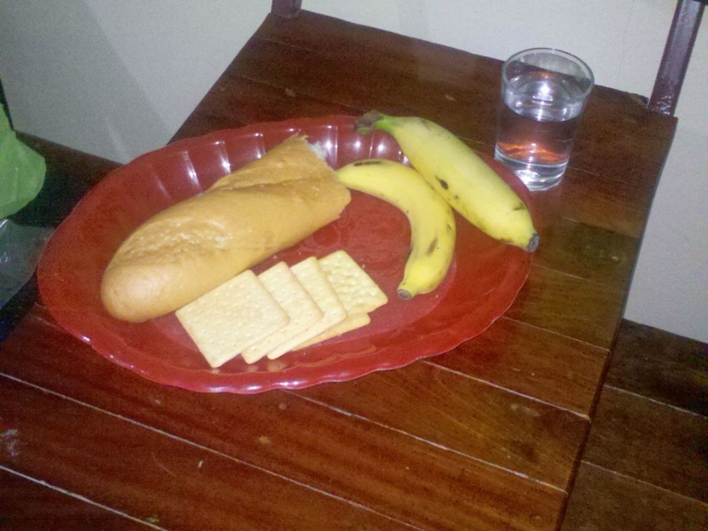 Bread cheese and banana on a plate