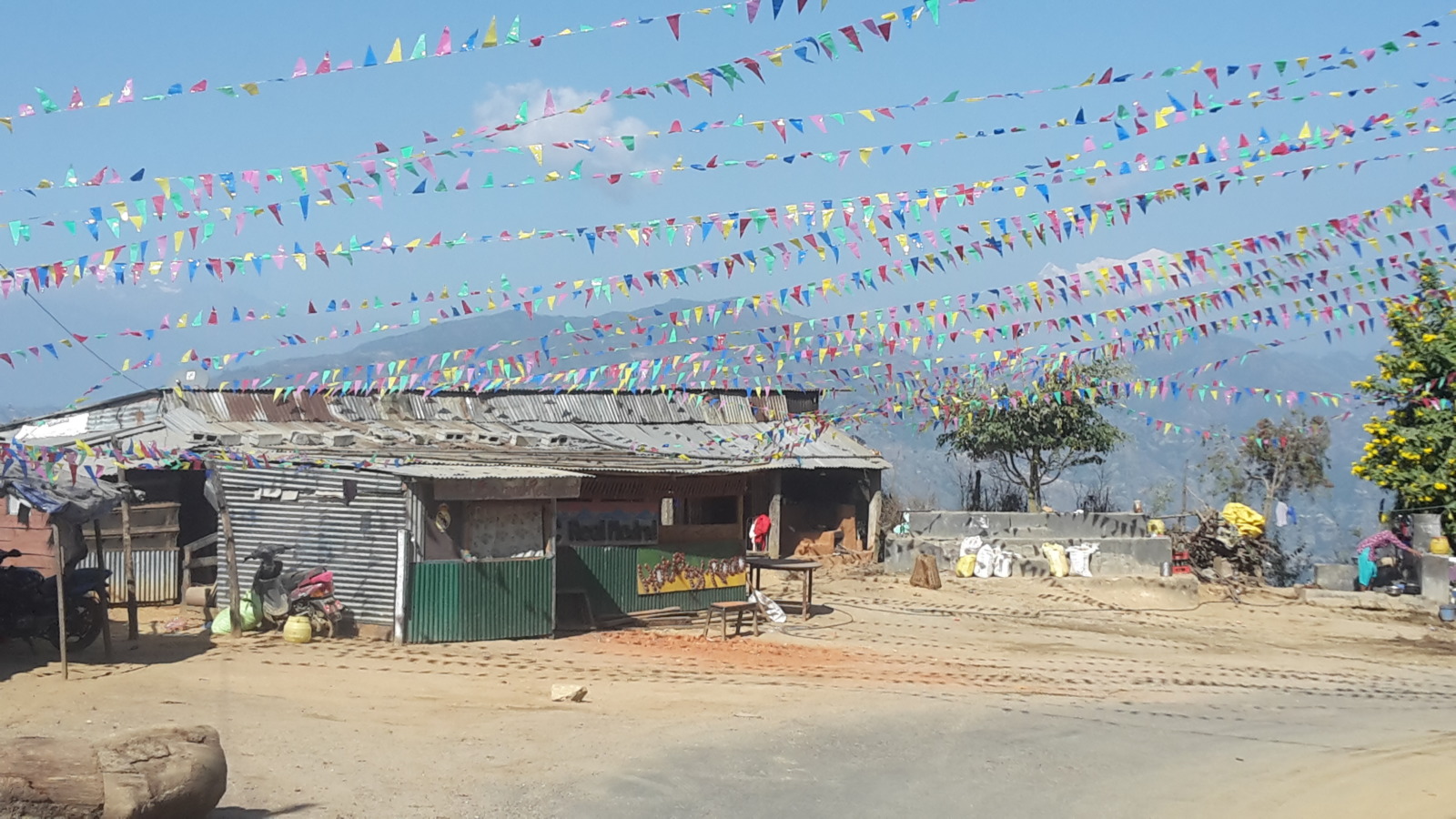 Flags at one of the villages on the Tribhuvan Highway.