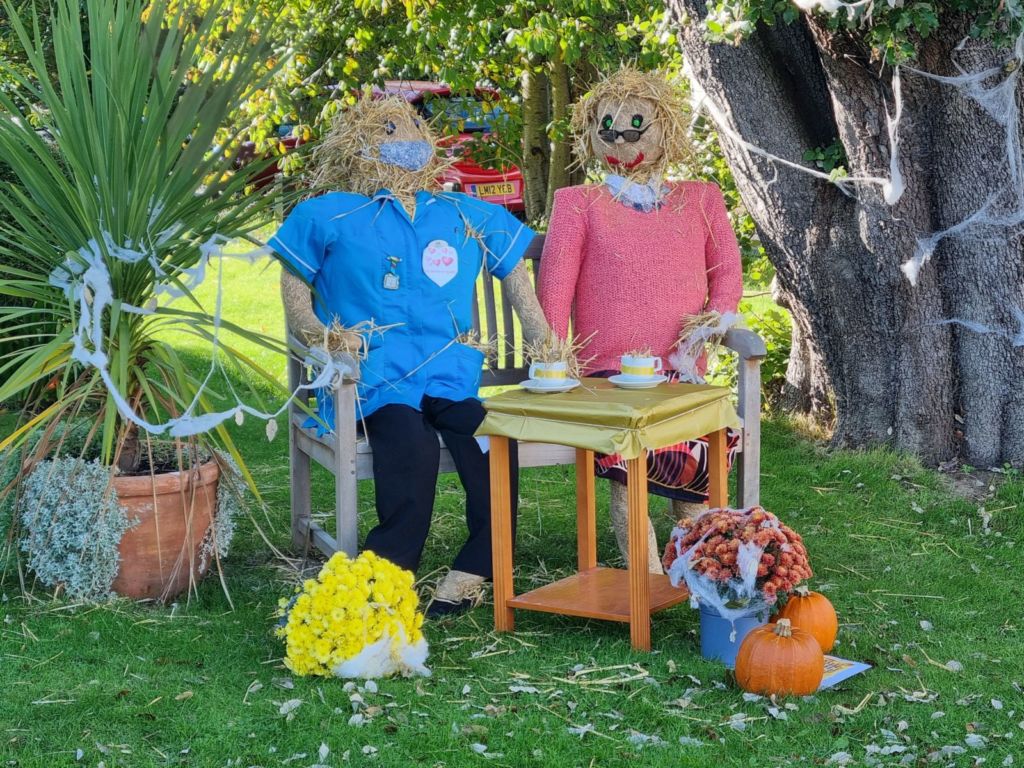 Scarecrows on bench