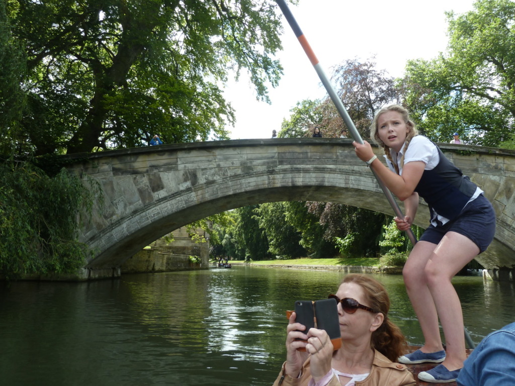 Girl punting on a river