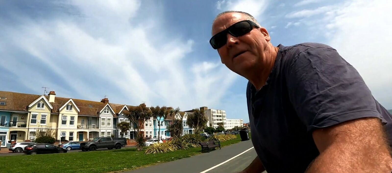 Houses and man in sunglasses