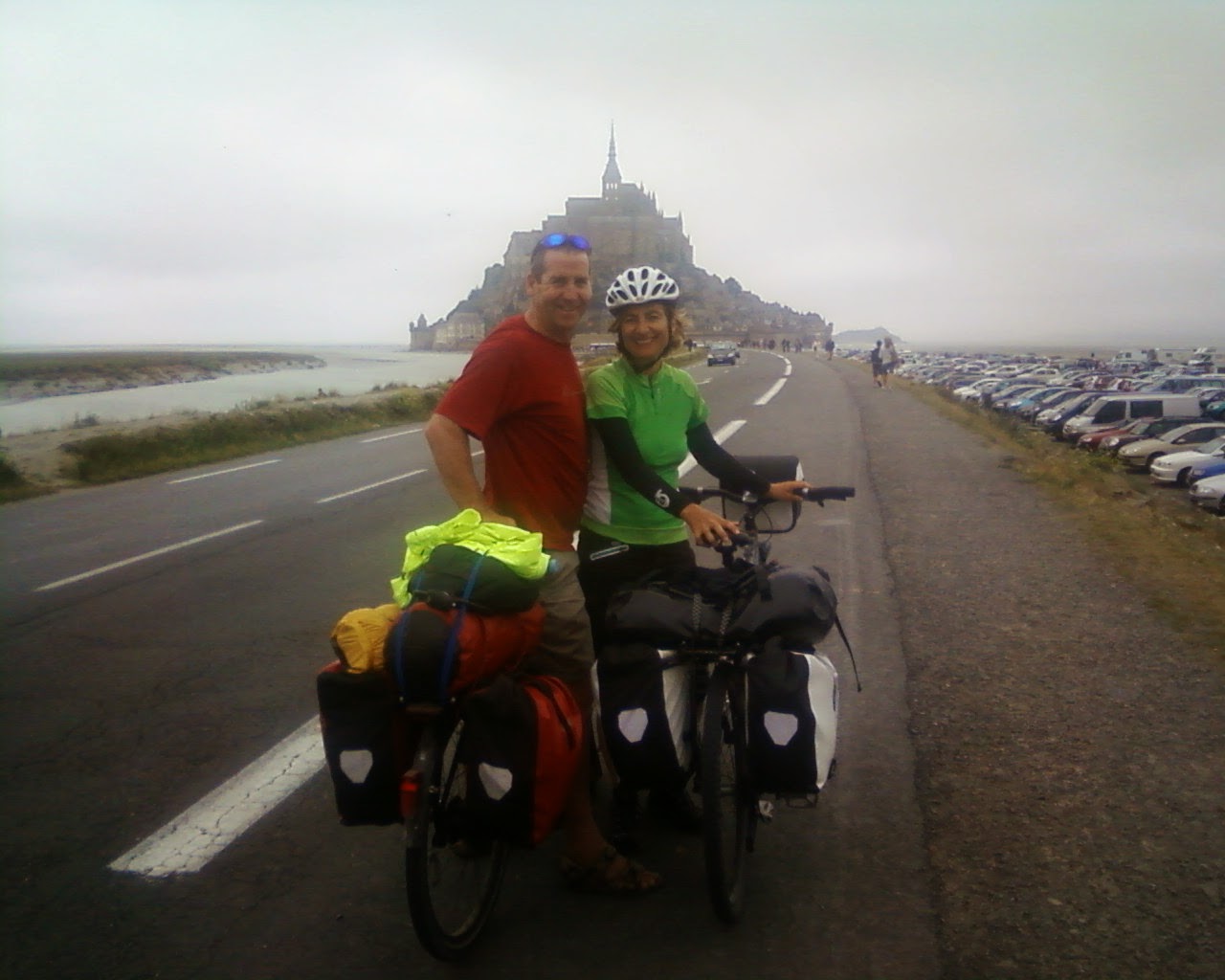 Man and woman with touring bicycles